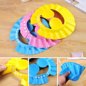 Verstellbare Schutzkappe für Babyduschen